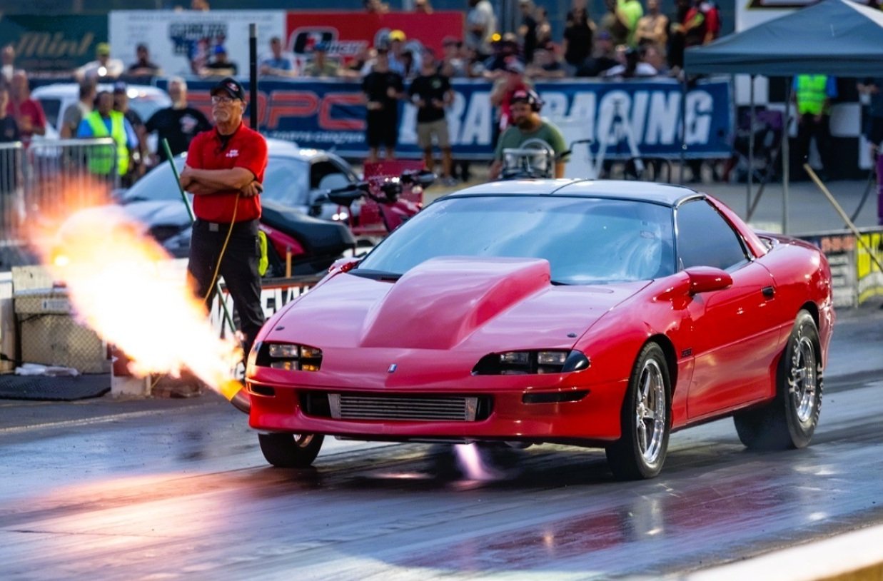 Drag racing performance car illustrating Holley EFI, ignition, and drivetrain upgrade planning