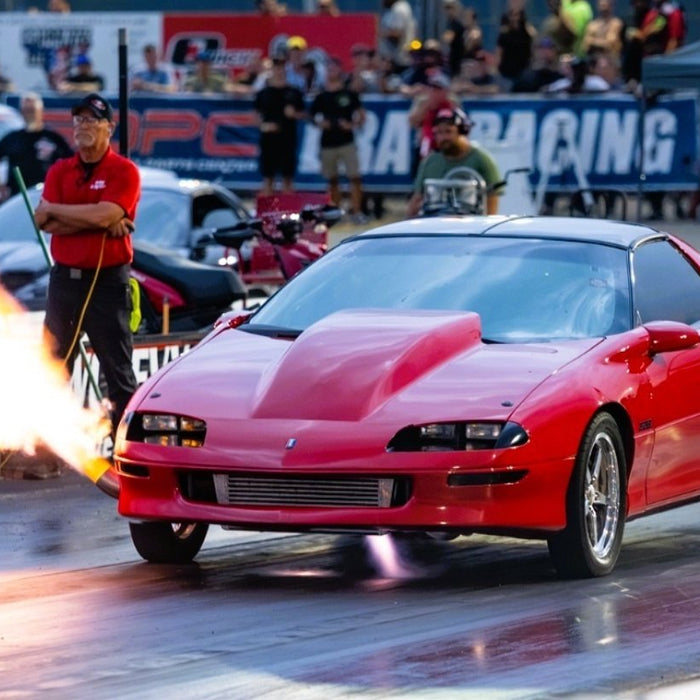 Drag racing performance car illustrating Holley EFI, ignition, and drivetrain upgrade planning