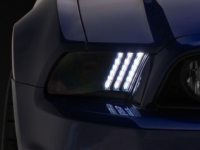 Raxiom 13-14 Ford Mustang LED Projector Headlights SEQL Turn Signals- Black Housing (Clear Lens)