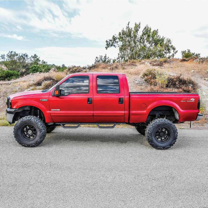 Westin 1999-2016 Ford F-250/F-350/F-450/F-550 Crew Cab Outlaw Drop Nerf Step Bars Textured Black