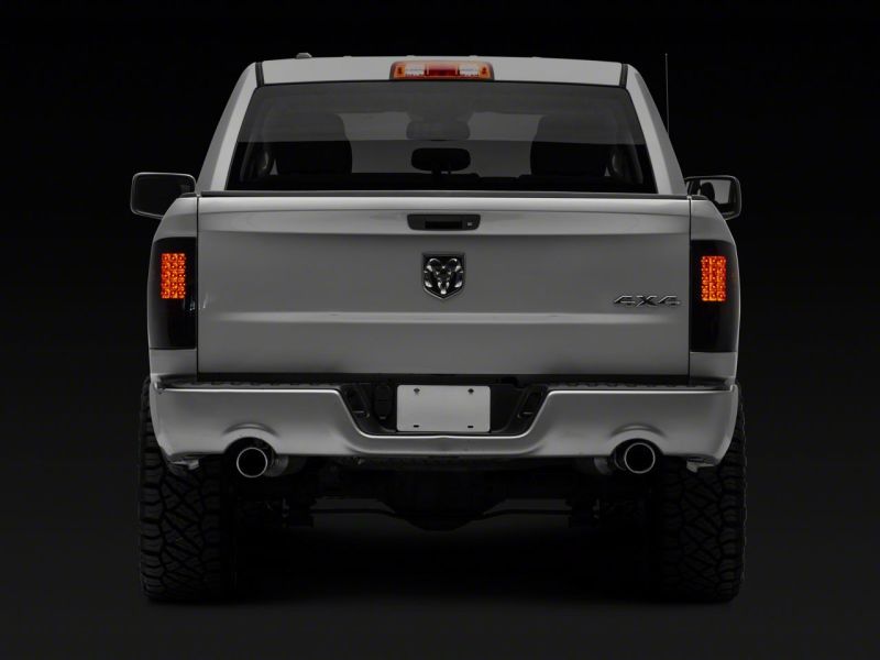 Raxiom 09-18 Dodge RAM 1500/2500/3500 Axial Series LED Tail Lights- Black Housing- Smoked Lens