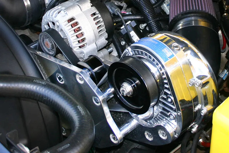 ProCharger 1LS700 LS truck-accessory swap installation reference showing optional polished supercharger and bracket; engine and vehicle accessories not included.