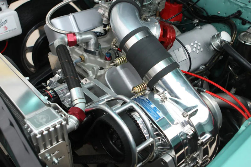 Manufacturer F-1X/F-2 custom Chevy installation reference, shown polished; head unit, charge cooling and supplied hardware vary by selected kit.