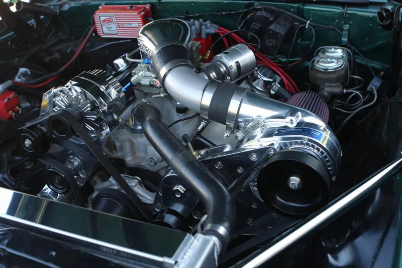 Manufacturer small-block Chevy P/D-series installation example with polished finish and optional accessories; selected head unit and kit contents vary.