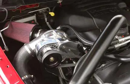 ProCharger manufacturer 2009-2010 RAM HEMI installation reference with polished supercharger; selected finish and kit equipment may differ.