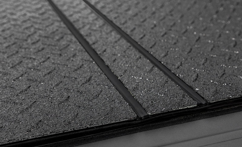 Access LOMAX Pro Series Tri-Fold Cover 07-19 Toyota Tundra 6ft6in Bed (Deck Rail) - Blk Diamond Mist